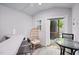 Well-lit cabana interior with white walls, bar seating, and a view of the outdoors at 2210 Bedford Ave, Raleigh, NC 27607