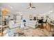 Bright living room with modern sofa, decorative rug, and seamless transition to kitchen at 2210 Bedford Ave, Raleigh, NC 27607