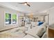 Bright living room with modern sofa and an open layout at 2210 Bedford Ave, Raleigh, NC 27607