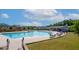 Large community pool with plenty of seating and a clubhouse in a desirable location at 232 Kanewind Ter, Apex, NC 27523