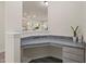 Hallway office nook with desk and granite countertop at 232 Kanewind Ter, Apex, NC 27523