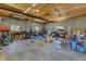 Spacious garage interior with wood ceiling, concrete walls, and plenty of storage at 2501 Ferrell Rd, Durham, NC 27704