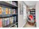 Cozy nook features a bookcase, sitting area and window for natural light at 2501 Ferrell Rd, Durham, NC 27704