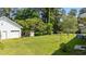 Expansive backyard features mature trees, a storage shed and a detached garage at 2910 Dove Ln, Raleigh, NC 27604