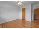 Bedroom featuring hardwood floors, neutral walls and doors at 2910 Dove Ln, Raleigh, NC 27604