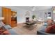 Elegant living area features a fireplace, light colored walls, and hardwood floors at 2910 Dove Ln, Raleigh, NC 27604