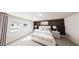 Stylishly furnished bedroom with large windows and neutral color scheme at 2917 Alyssa Ct, Knightdale, NC 27604