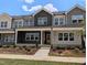 Attractive townhome exterior with colorful accents, well-maintained landscaping, and an inviting entrance at 2917 Alyssa Ct, Knightdale, NC 27604