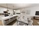 Open kitchen and dining area with an island and bar seating at 2917 Alyssa Ct, Knightdale, NC 27604