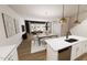 Open-concept living and dining area with modern lighting and ample natural light at 2917 Alyssa Ct, Knightdale, NC 27604