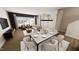 Spacious living area with large windows, comfortable seating, and modern decor at 2917 Alyssa Ct, Knightdale, NC 27604