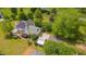 Aerial view of home with solar panels featuring a deck and a red outbuilding at 303 Crooked Meadow Ln, Hillsborough, NC 27278