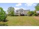 A beautiful shot of the expansive backyard, perfect for outdoor activities and relaxation at 303 Crooked Meadow Ln, Hillsborough, NC 27278