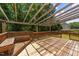 Spacious wooden back deck with pergola and bench seating, perfect for outdoor relaxation and entertaining at 3069 Buttonwood Ln, Clayton, NC 27520