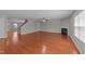 This cozy living room boasts gleaming hardwood floors and a delightful ambiance at 3069 Buttonwood Ln, Clayton, NC 27520