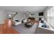 Inviting living room featuring hardwood floors, a fireplace, and comfortable modern furnishings at 3069 Buttonwood Ln, Clayton, NC 27520