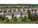 Charming neighborhood featuring well-maintained lawns and diverse home styles, all surrounded by lush greenery at 309 Windy Peak Loop, Cary, NC 27519