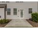 Clean back patio with vinyl siding, showcasing the home's outdoor living space at 309 Windy Peak Loop, Cary, NC 27519
