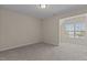 Bedroom featuring neutral carpet and walls with an alcove window seat at 309 Windy Peak Loop, Cary, NC 27519