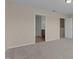 Spacious bedroom featuring neutral walls and carpet with access to bathroom at 309 Windy Peak Loop, Cary, NC 27519
