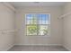 Walk-in closet with built-in shelving for organized storage and natural light at 309 Windy Peak Loop, Cary, NC 27519