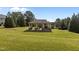 Picturesque gazebo on expansive lawn perfect for picnics and outdoor gatherings at 309 Windy Peak Loop, Cary, NC 27519