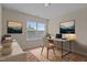 Home office with decor, a large window, and hardwood flooring with an area rug at 309 Windy Peak Loop, Cary, NC 27519