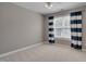 Bright bedroom with neutral carpet and curtains, ceiling fan, and natural light at 3315 Swinford Ct, Raleigh, NC 27604