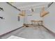 Clean garage with overhead storage and workbench at 3315 Swinford Ct, Raleigh, NC 27604