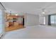 Open-concept layout featuring plush carpet and seamless transition to the kitchen area at 3315 Swinford Ct, Raleigh, NC 27604