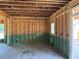 Interior home construction showing the framing, electrical and plumbing of an unfinished room at 337 Green Pines Estates Dr, Kenly, NC 27542