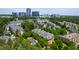Beautiful aerial view showcasing the community, with lush greenery and a cityscape backdrop at 340 Allister Dr # 201, Raleigh, NC 27609