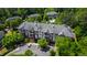 Beautiful aerial view showcasing the community, with lush greenery, parking, and multiple living spaces at 340 Allister Dr # 201, Raleigh, NC 27609