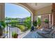 Comfortable covered balcony with a ceiling fan, outdoor furniture, plants, and a view of the community at 340 Allister Dr # 201, Raleigh, NC 27609