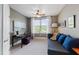 Cozy bedroom featuring a daybed, desk, natural light, and ceiling fan at 340 Allister Dr # 201, Raleigh, NC 27609