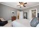 Spacious bedroom showcasing a ceiling fan, comfortable seating, and ample natural light at 340 Allister Dr # 201, Raleigh, NC 27609