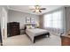 Comfortable bedroom with soft lighting, ceiling fan, and ample natural light at 340 Allister Dr # 201, Raleigh, NC 27609