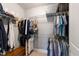 Walk-in closet with shelving, hanging space, and a carpeted floor, providing ample storage at 340 Allister Dr # 201, Raleigh, NC 27609