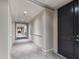 Hallway with neutral walls, decorative carpet, and views of unit 201 and other spaces at 340 Allister Dr # 201, Raleigh, NC 27609