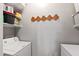 Laundry room featuring white appliances and shelving for storage solutions at 340 Allister Dr # 201, Raleigh, NC 27609