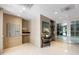 Elegant lobby area featuring elevator access, mailbox station, and table with decorative flowers and art at 340 Allister Dr # 201, Raleigh, NC 27609