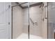 Modern bathroom shower featuring glass enclosure and convenient grab bar at 340 Allister Dr # 201, Raleigh, NC 27609