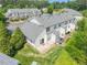Aerial view of backyard featuring patio, green space, and neighborhood setting at 3601 Sugar Tree Pl, Durham, NC 27713