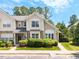 Charming townhouse with neutral siding, stone accents, manicured bushes, and a lovely walkway at 3601 Sugar Tree Pl, Durham, NC 27713