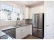 Well-lit kitchen with stainless steel appliances and countertops at 3601 Sugar Tree Pl, Durham, NC 27713