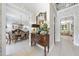 Charming entryway showcasing a console table, mirror, and seamless transition into the formal dining and living areas at 3617 Carlow Ct, Raleigh, NC 27612