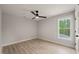 Bright bedroom features a ceiling fan, and luxury vinyl plank flooring at 380 Pilot Ridge Rd, Zebulon, NC 27597