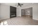 Stylish living room with a black brick fireplace and open access to the adjacent dining room at 380 Pilot Ridge Rd, Zebulon, NC 27597