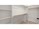 Walk-in closet features built-in shelving and racks offering ample storage space at 380 Pilot Ridge Rd, Zebulon, NC 27597