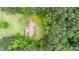 An aerial view of a house nestled within a lush and densely wooded area at 4006 Daniel Rd, Durham, NC 27703